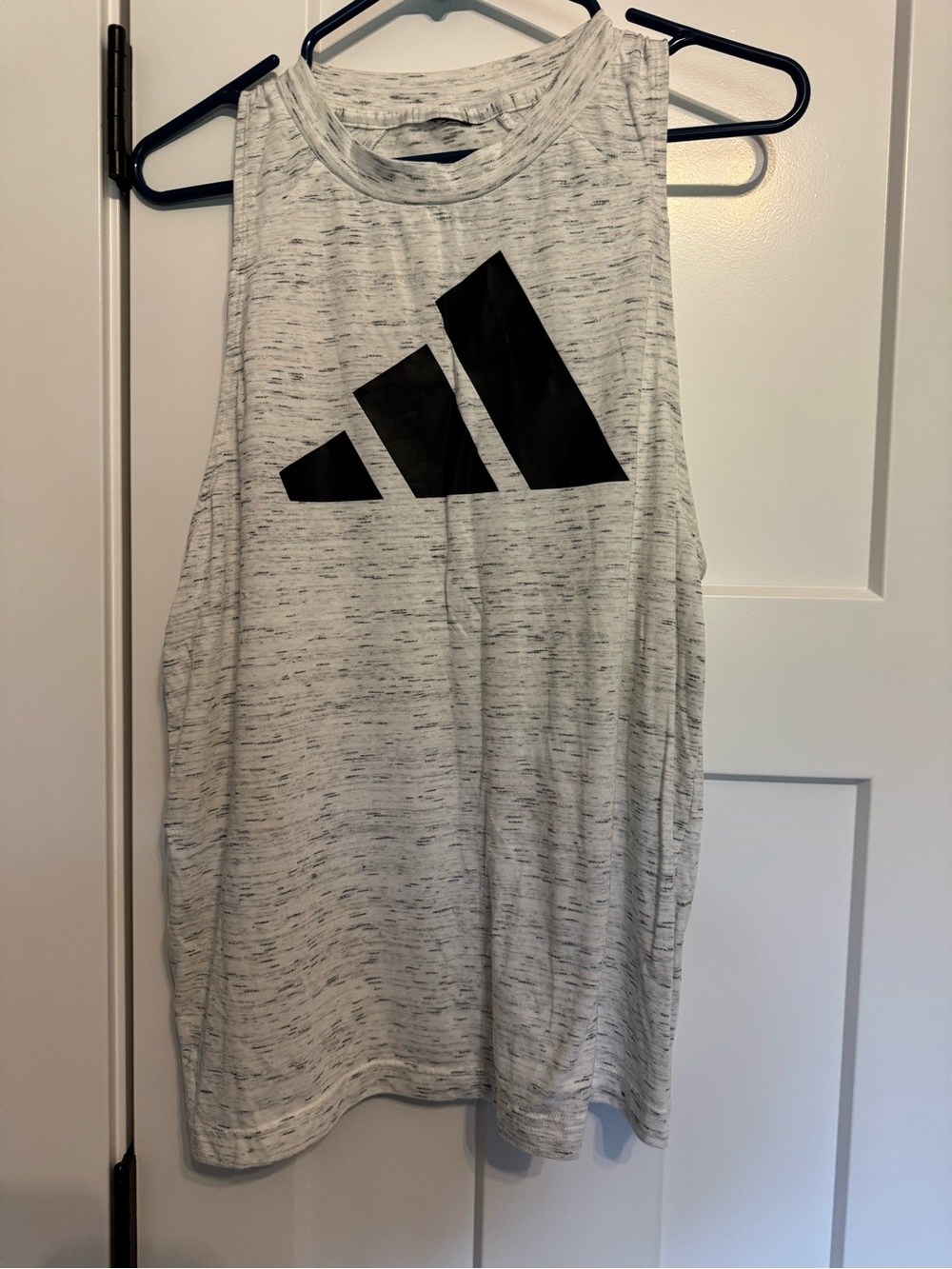 Adidas Tank atop